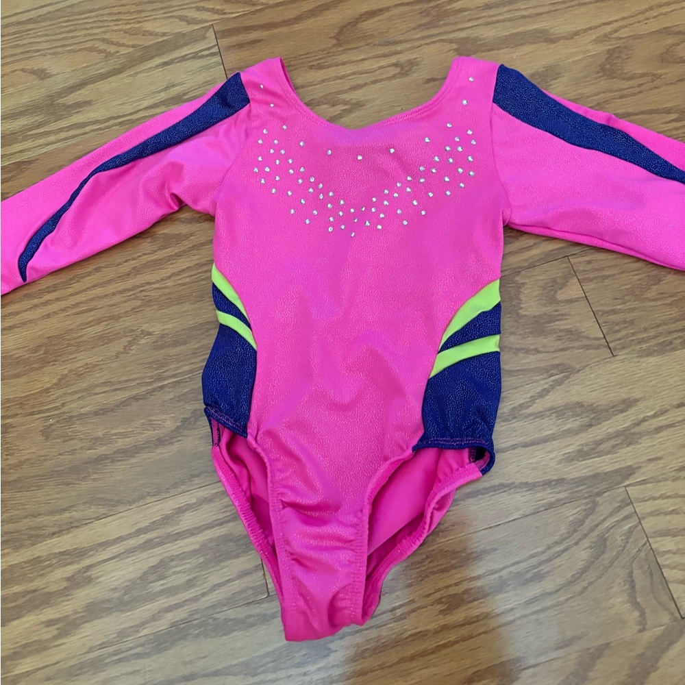 Girls gymnastics pink leotard size 4/5. Made by freestyle by Danskin -